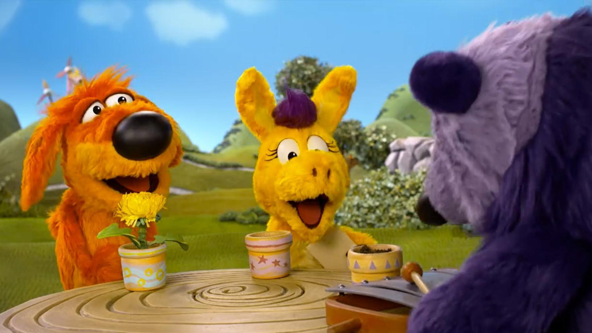 Donkey and Panda compete against each other./The pals grow Dancing Dandelions with music.